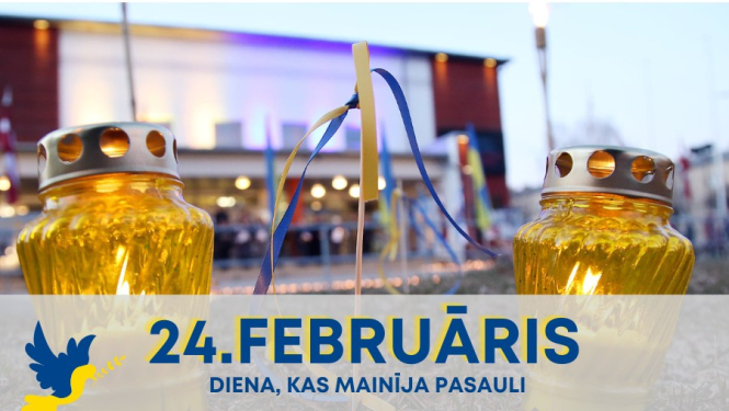 divas dzeltenas svecītes un Ukrainas karodziņš