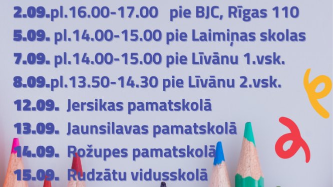 krāsaini zīmuļi un teksts