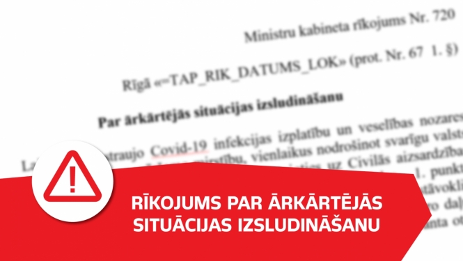 Uz dokumenta fona uzraksts uz sarkana par ārkārtējas situācijas izsludināšanu