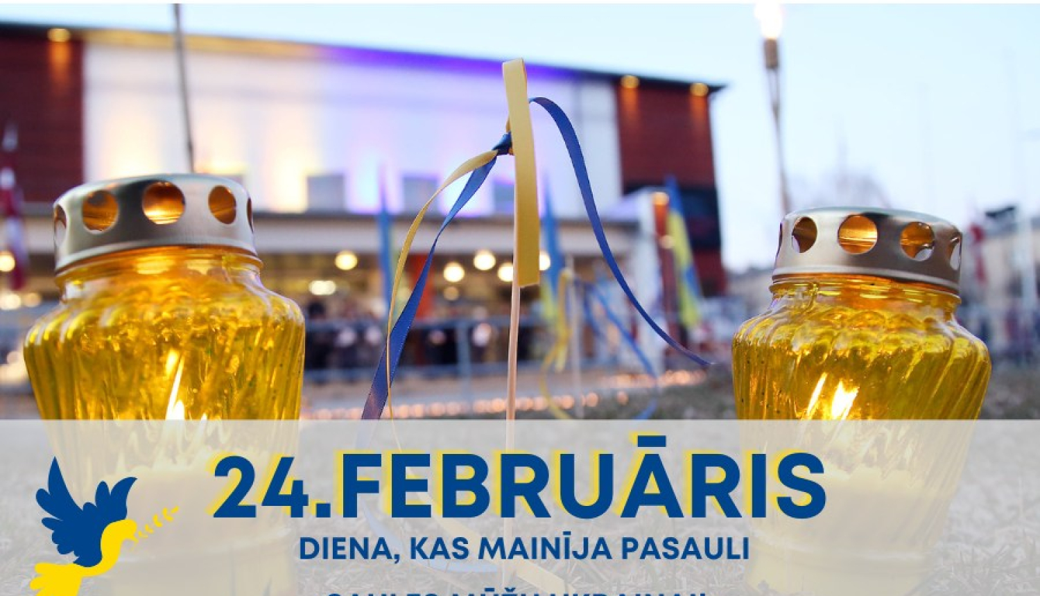 divas dzeltenas svecītes un Ukrainas karodziņš